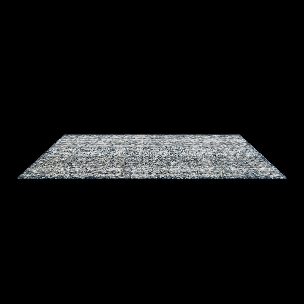 Navy blue and grey rug shown at an angle on a plain white background with no surrounding room.